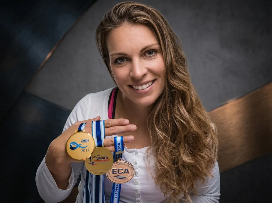 Three world championship medals held together
